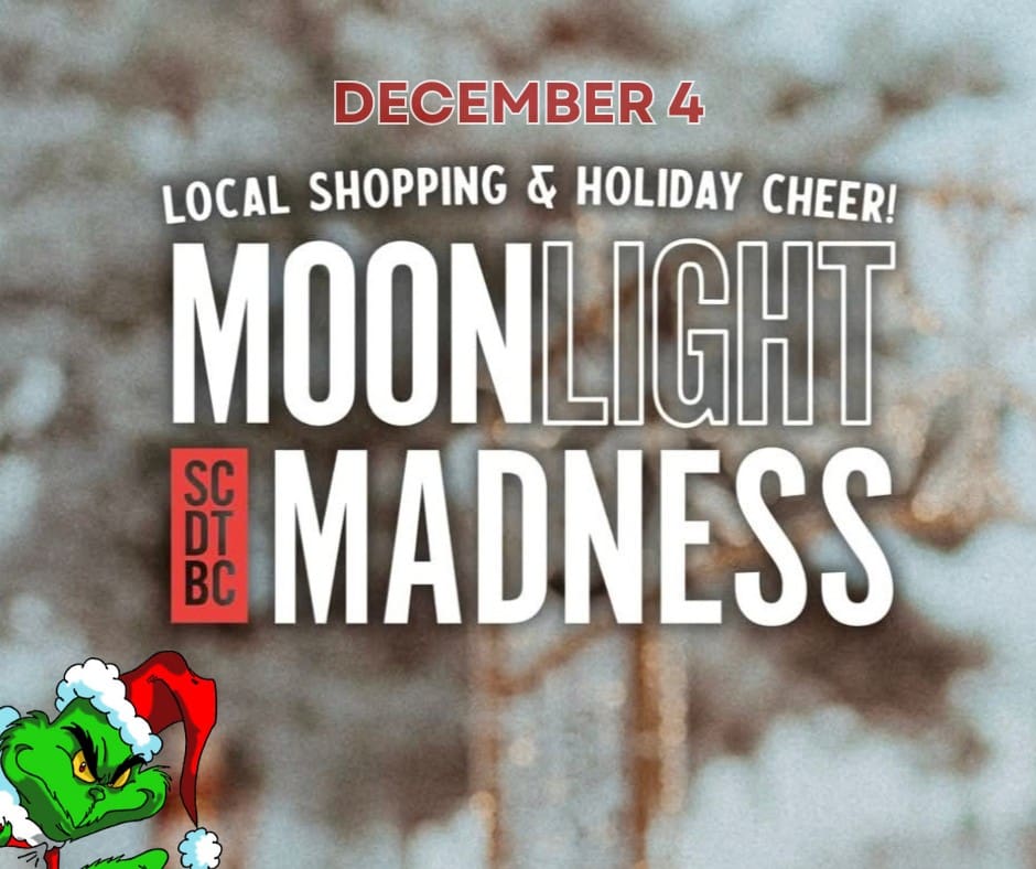 David Zammit, Marissa Wolfe, and Kate Andriushyn pose with the grand total for the 2024 Radiothon, $46,860.